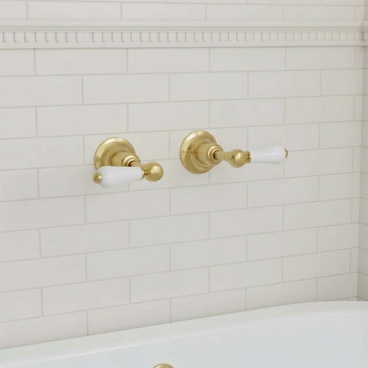 Brushed brass wall-mounted stop valve