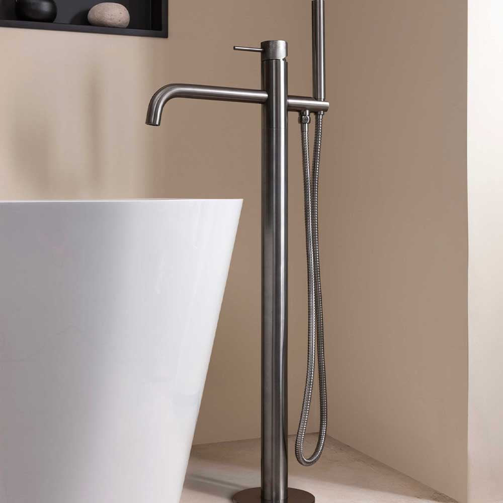 Floor standing bath tap with shower brushed black