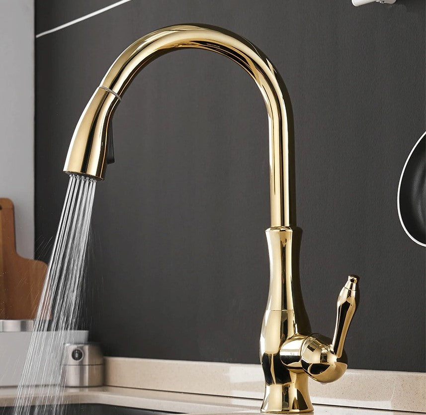 Gold kitchen tap with pull out function