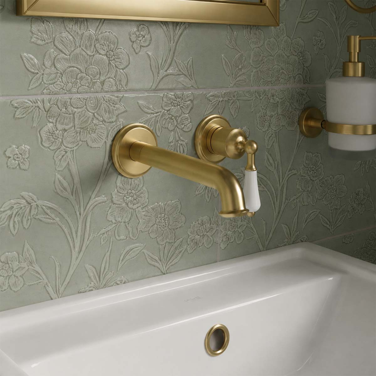 Traditional brushed brass single lever basin tap wall mounted in Irealand