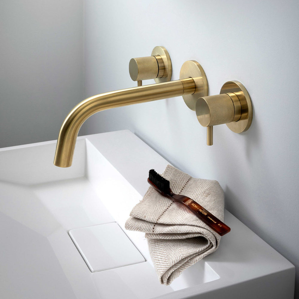 Brushed brass basin mixer spout