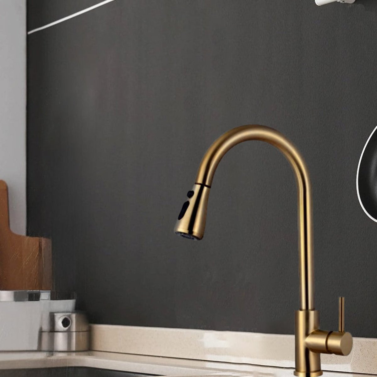 Gold kitchen tap with pull out spray