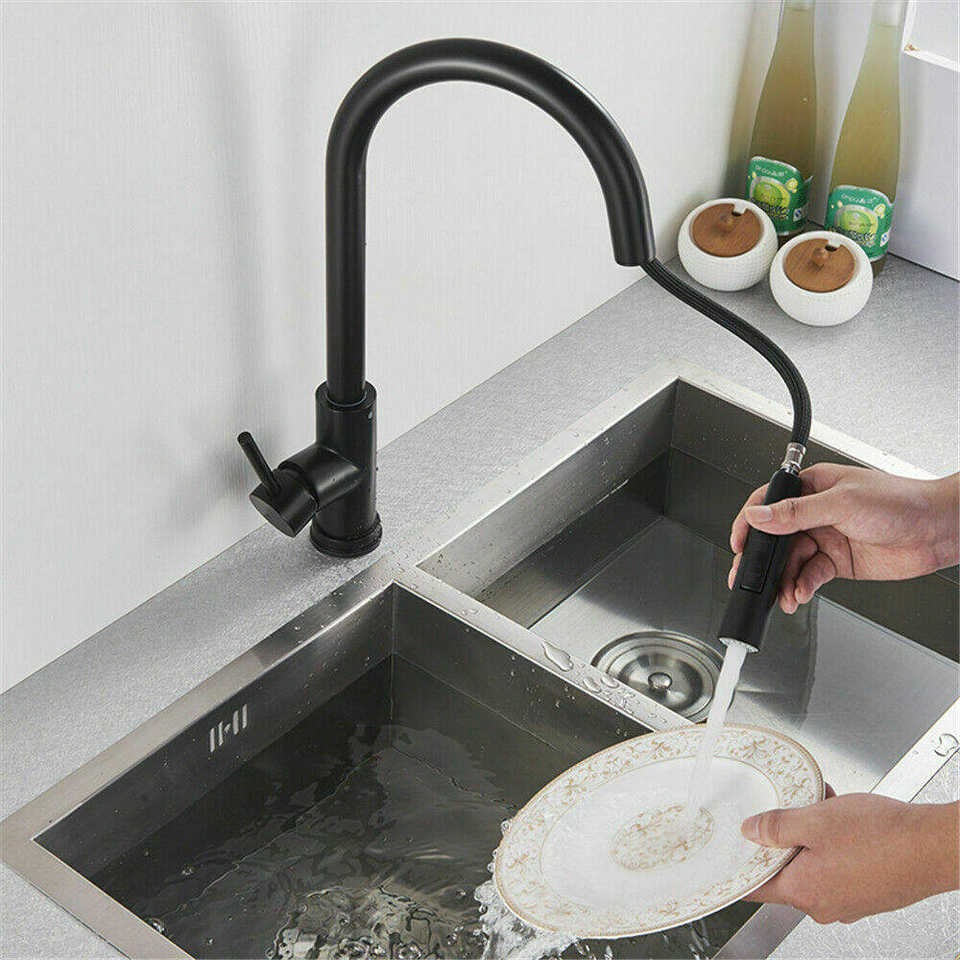 Black kitchen tap with pull out spray