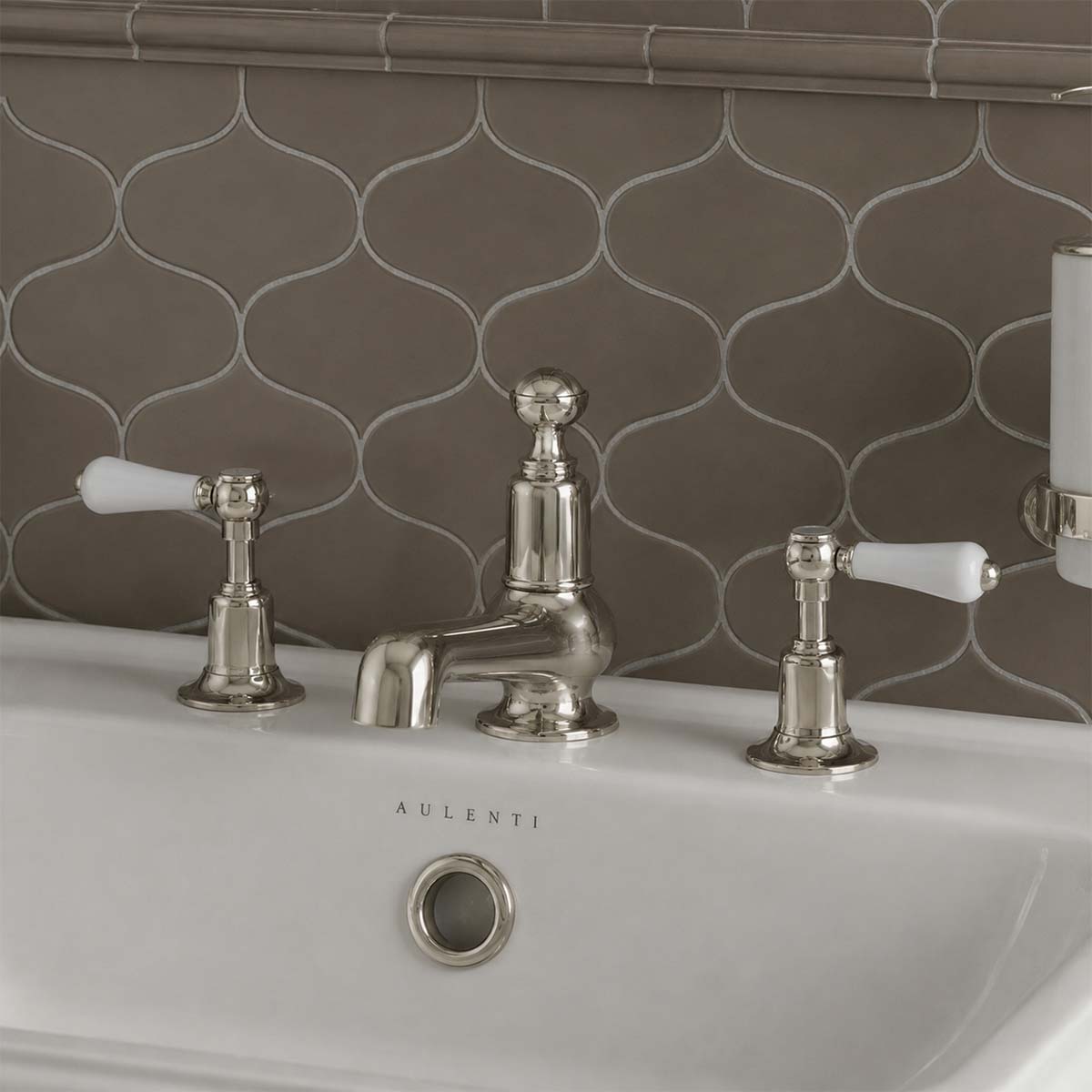 traditional deck mounted 3 hole brushed nickel basin tap in ireland