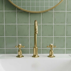 Antique brass basin tap with dual crosshead handle in Ireland