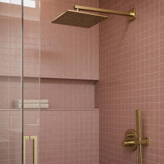 Brushed brass fixed ceiling mounted shower arm and shower head
