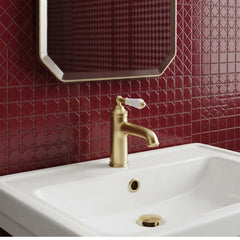 Brushed brass single lever basin tap