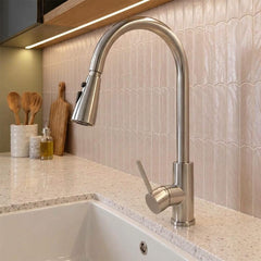 Brushed stainless steel kitchen tap with pull out spray