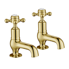 Antique brass deck-mounted bath tap