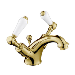 Brass basin tap with white ceramic accent twin lever handle and knob