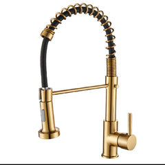 Gold kitchen tap with pull out spray