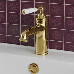 Deck mounted brass basin tap with lever - polished gold 