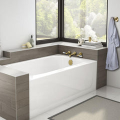 Gold basin tap and gold bathroom accessories