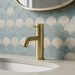 Gold deck-mounted basin tap