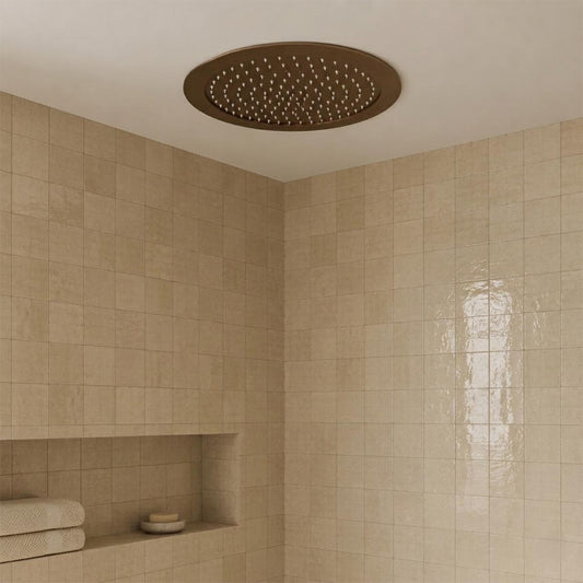 Round ceiling-mounted rain shower head in a warm bronze  1200