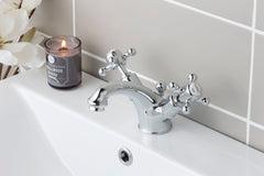 Brushed nickel basin mixer tap with dual crosshead handle