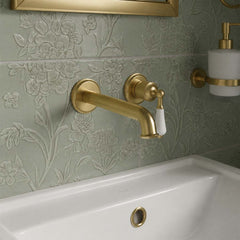 Traditional brushed brass single lever basin tap wall mounted in Irealand