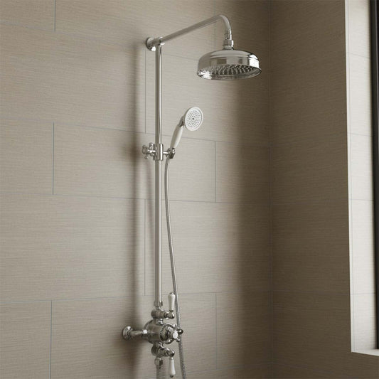 Traditional rigid riser with exposed shower valve, fixed shower head and handset - Ireland 