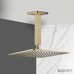 Brushed brass fixed ceiling mounted shower arm and shower head