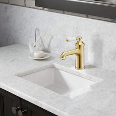 Brushed brass single lever basin tap