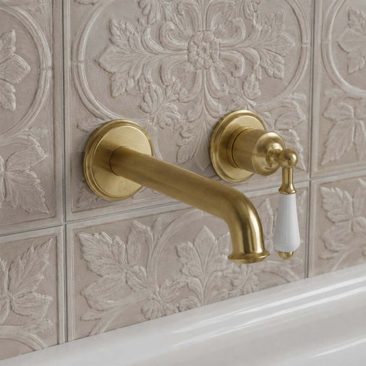 brushed brass single lever basin tap wall mounted  1200