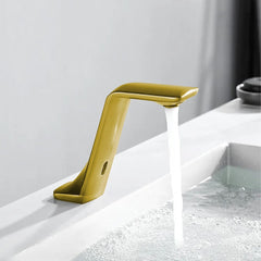Gold deck-mounted sensor tap