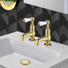Gold deck-mounted basin pillar tap 