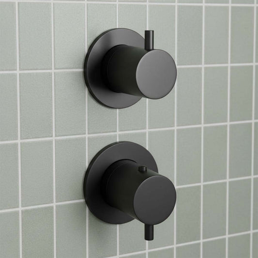 matt black wall-mounted thermostatic  shower valves with circular knobs and small lever handles 1200