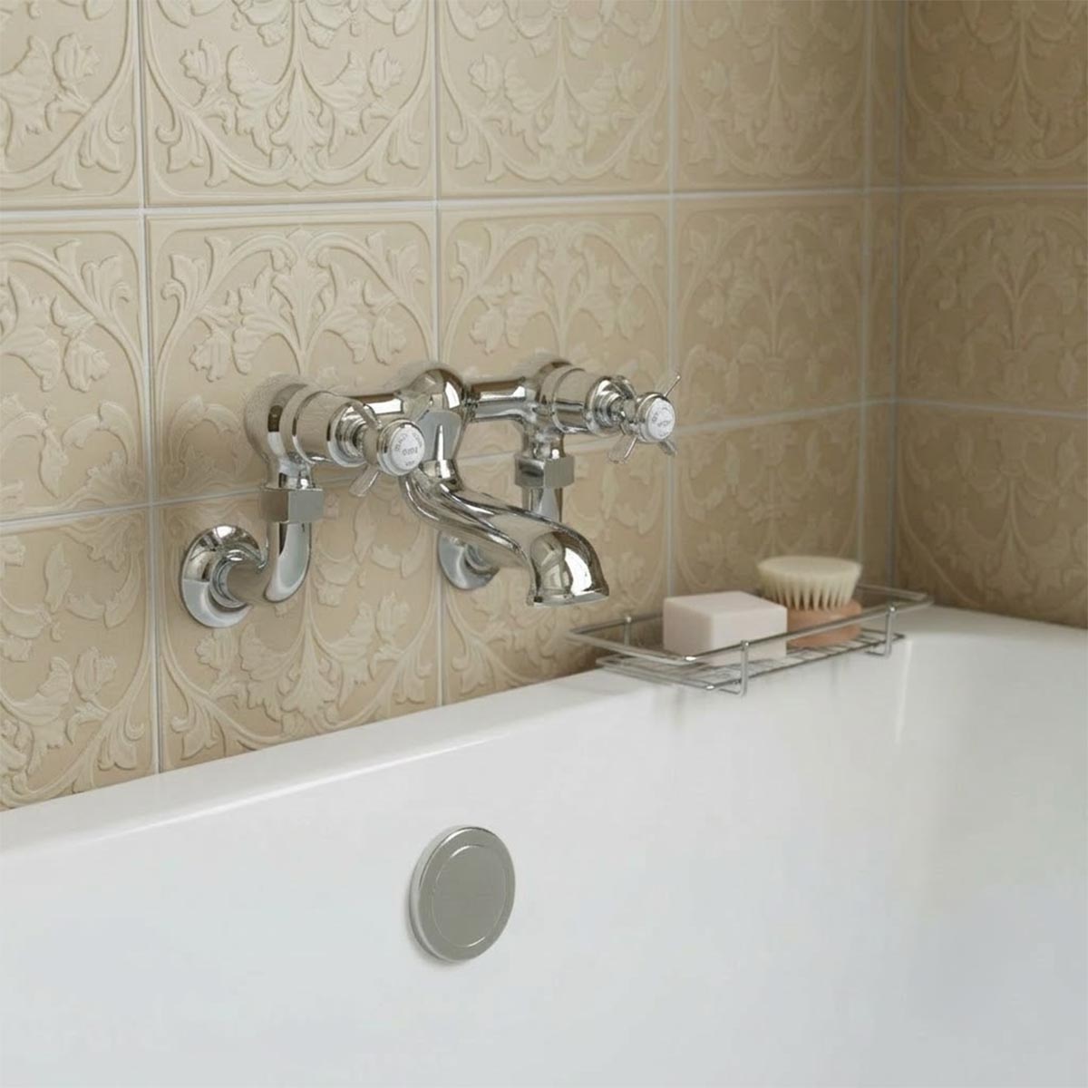 polished chrome wall mounted bath filler tap with two separate pinch style handles