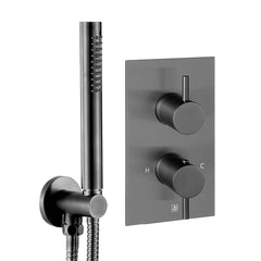 Wall mounted shower handset holder