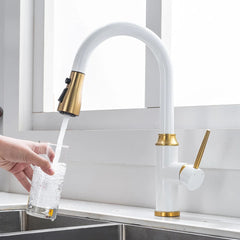 White and gold kitchen tap
